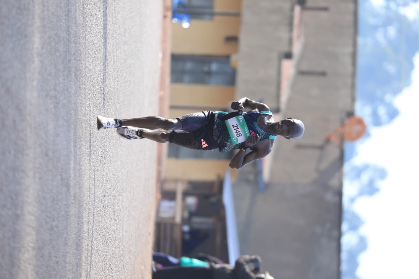 Lead pack of 42km Coffee Marathon runners on the open road
