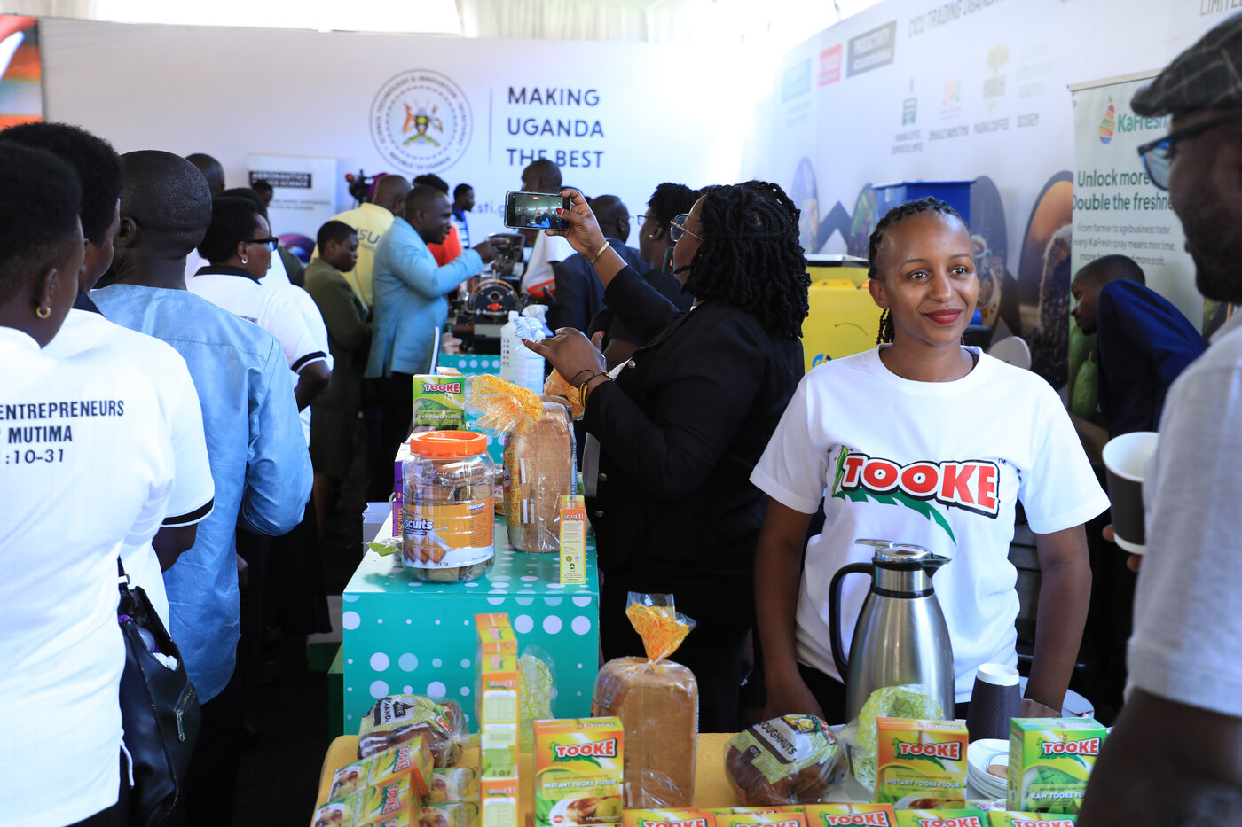 Coffee entrepreneur presenting products at an exhibition